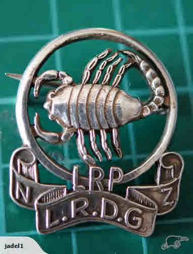 early style cap badge